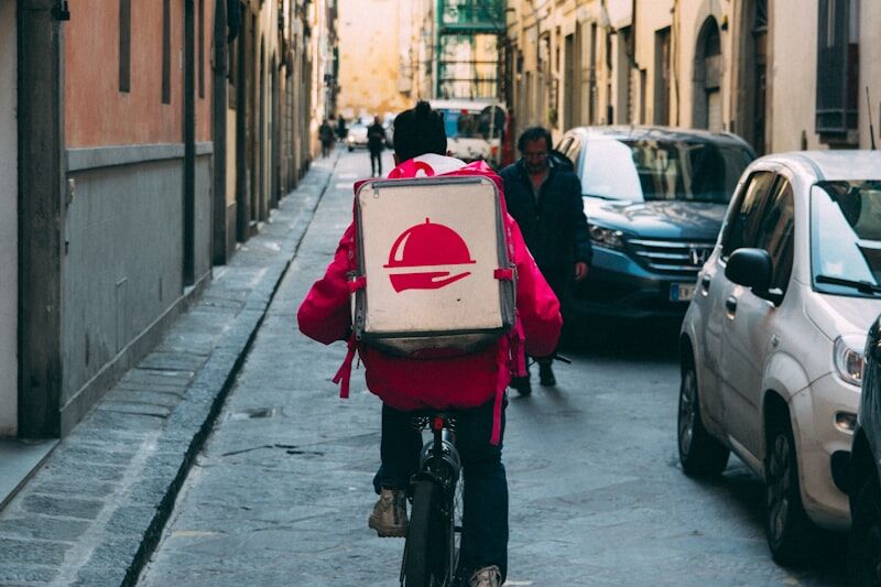 Food delivery rider on motorcycle